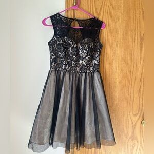 Women’s Black and Gold homecoming or cocktail dress